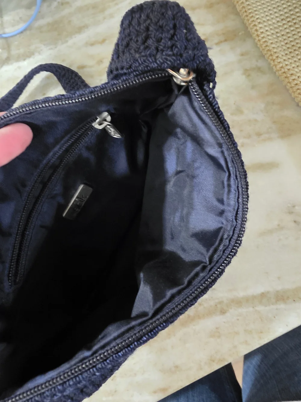 The Sak Black Crochet Crossbody with Logo Charm